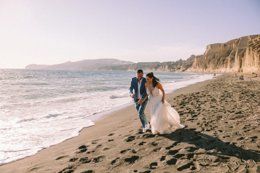 couple full of love in Santorini island captured by love in a frame photographer 